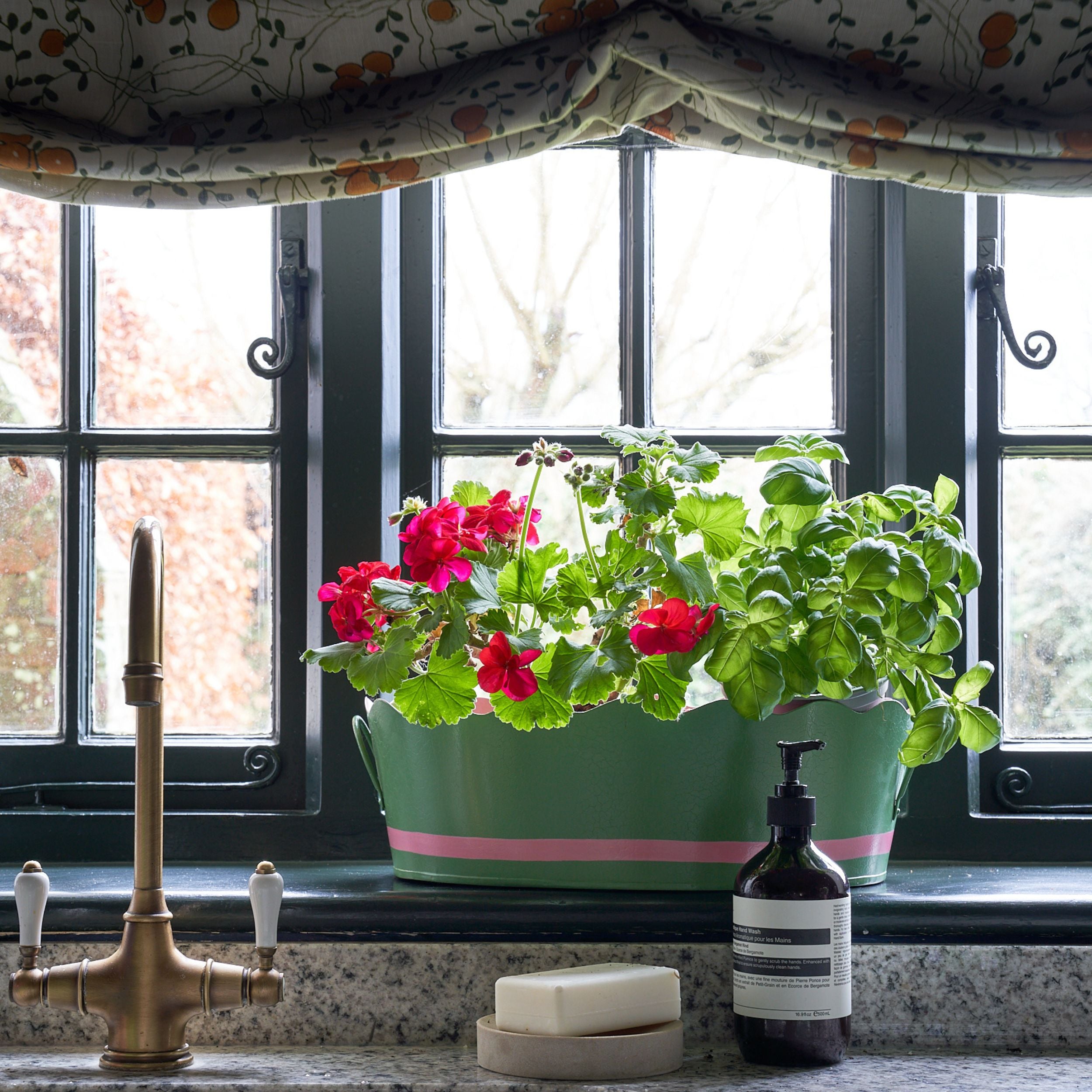 Scalloped edge green and pink planter